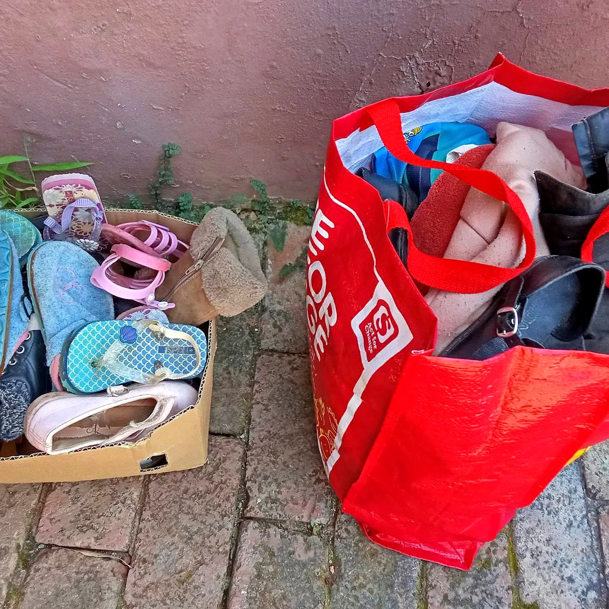Donated shoes and clothing being sorted for distribution